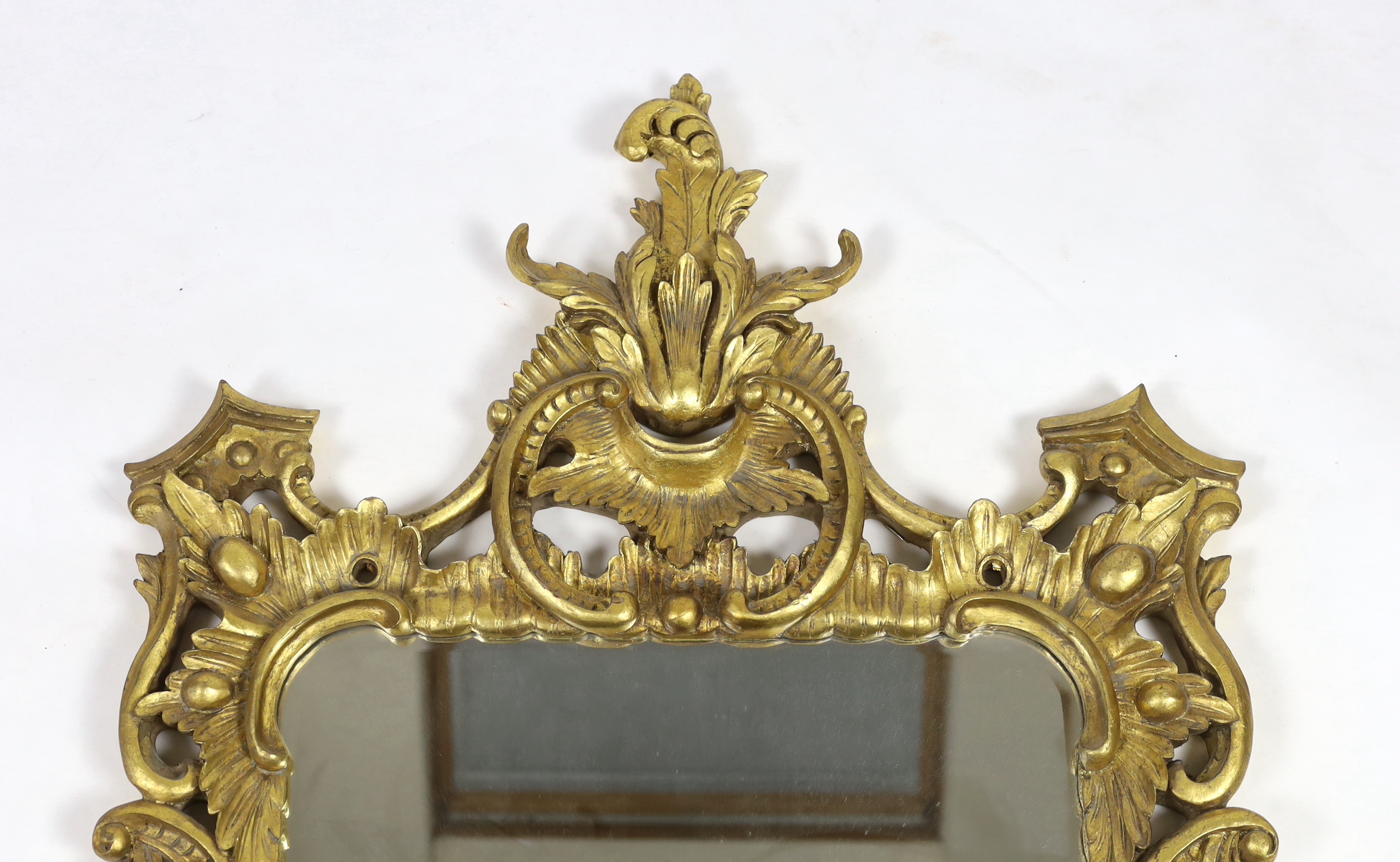 A 19th century Chippendale style carved giltwood wall mirror, width 78cm, height 154cm